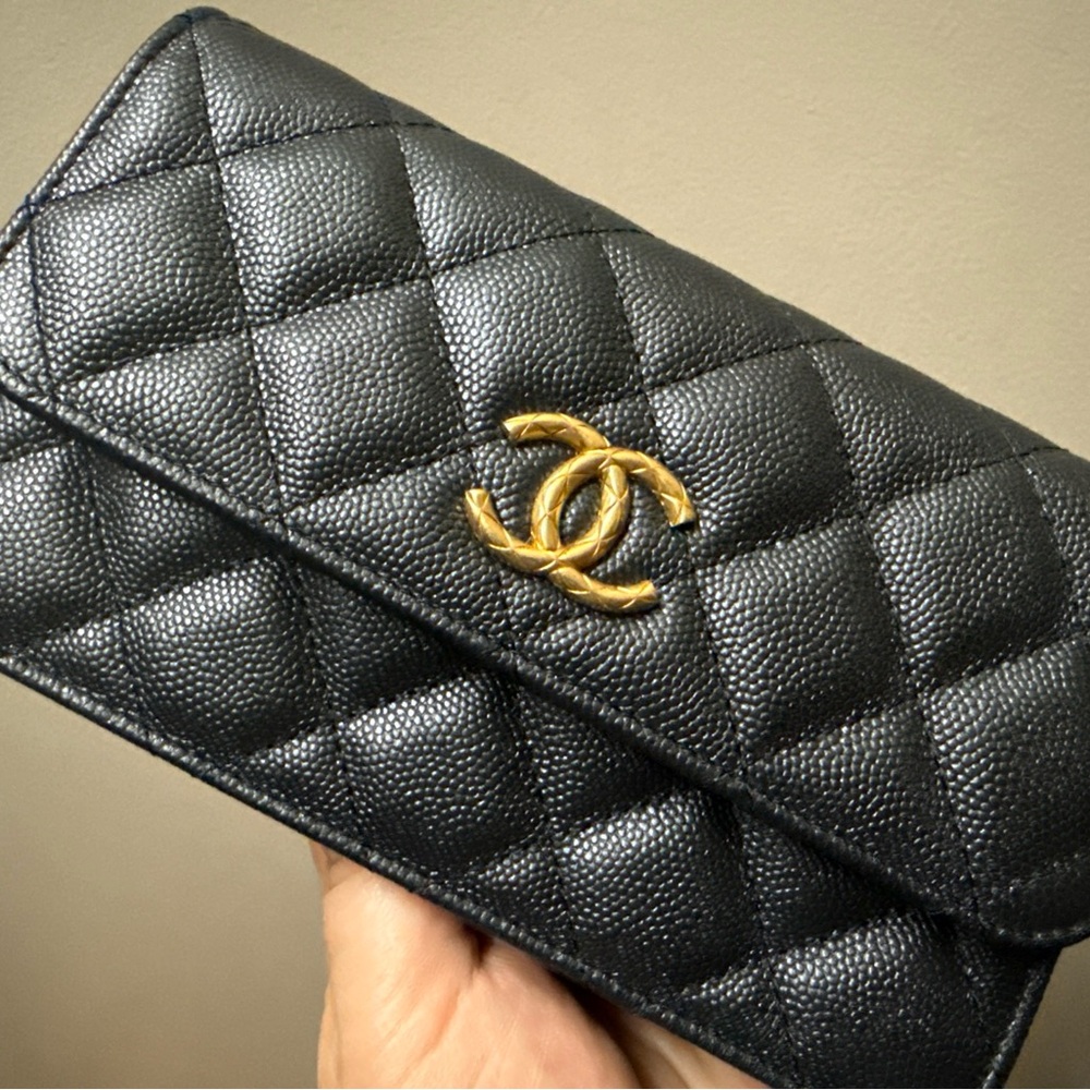 CHANEL Black Quilted Wallet with Gold Logo